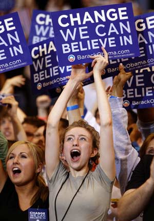 Supporters cheer as US Democratic presidential candidate Senator Barack Obama (D-IL) speaks at his South Dakota and Montana presidential primary election night rally at the Xcel Energy Center in St. Paul, Minnesota June 3, 2008. 