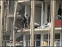 Afghan security men are seen at the Corrections Department building