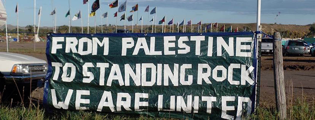 From Palestine to Standing Rock" banner (Photo: Haithem El-Zabri with creative help from PYM)